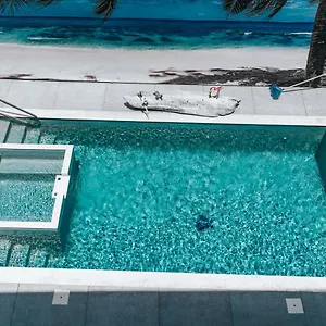 https://gray-door-apartments.comcaribbean.com